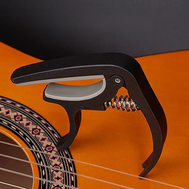Braçadeira universal de afinaç - Guitar Capo Clip avaliação e preço